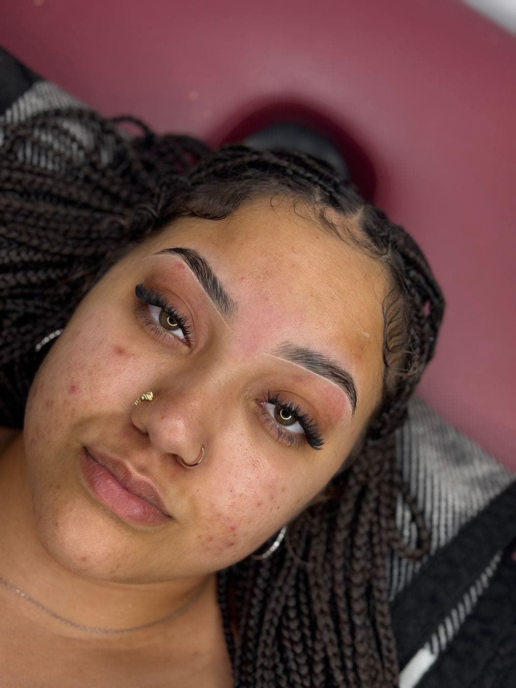 Brow lamination real client result — natural brow hair brushed up and set